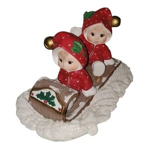 Large ceramic figurines set -holiday children on toboggan